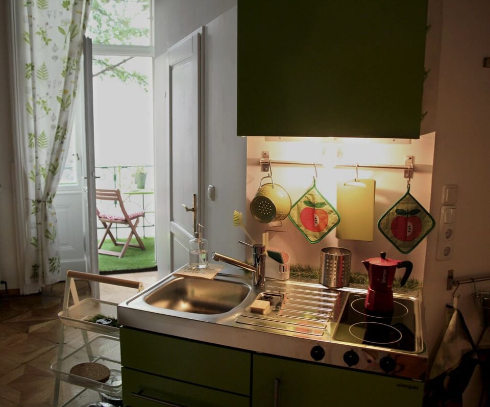 kitchen and view of balcony