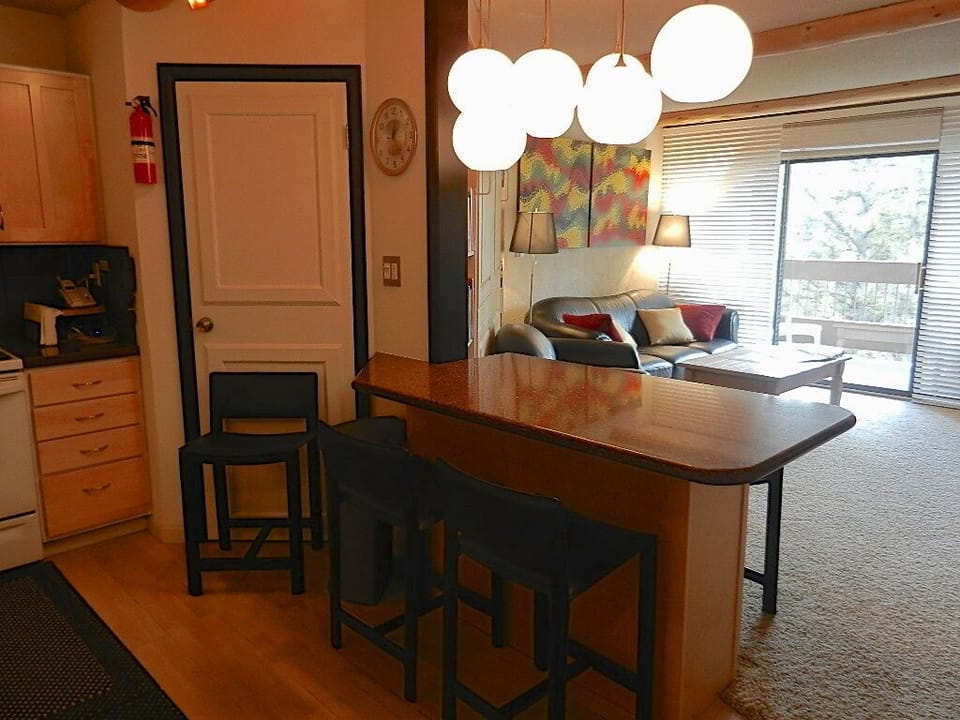 from Kitchen into the living room showing the dining area