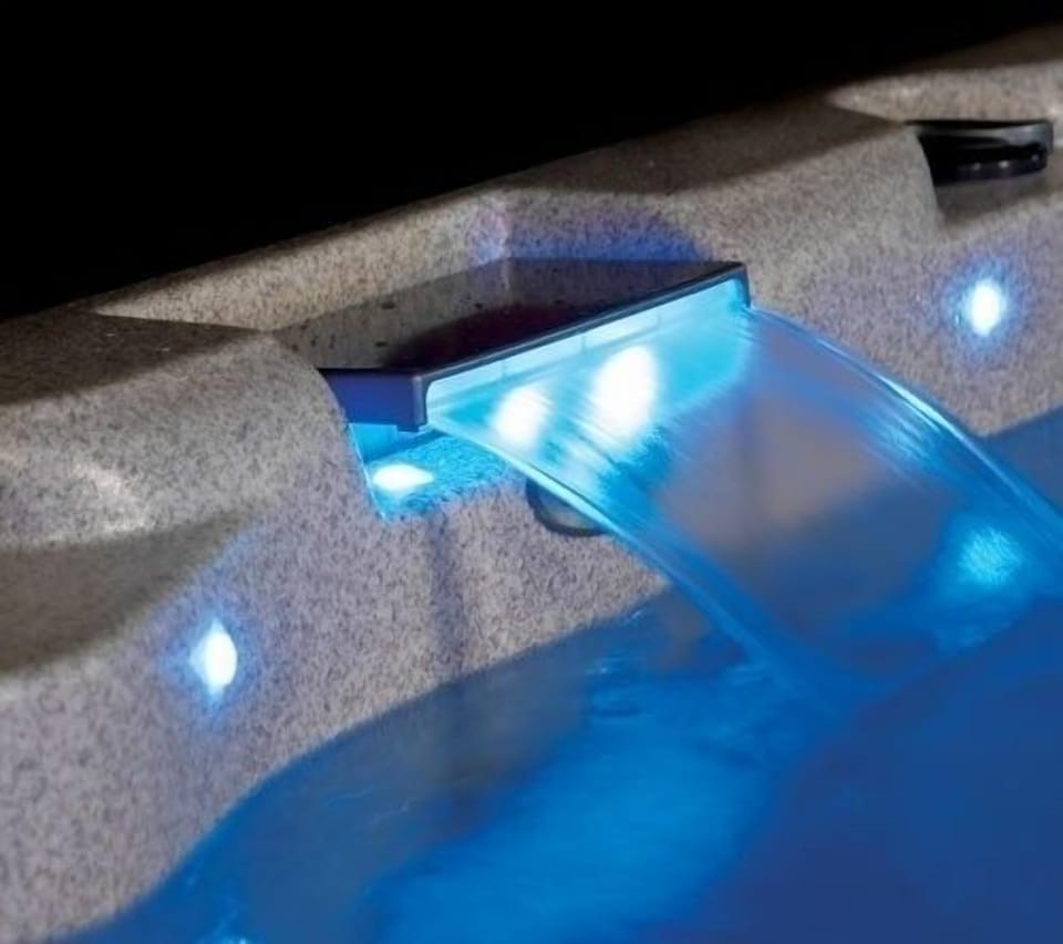 Jazuzzi brand hot tub on the deck just off the living room slider