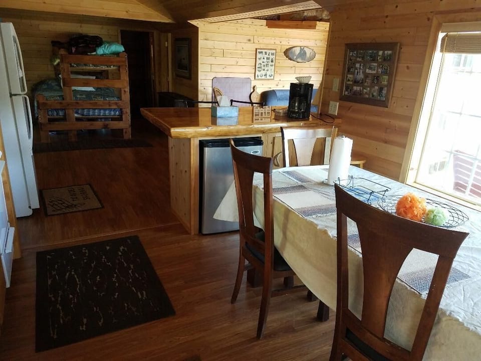 kitchen looking into L.R on right and bunk beds