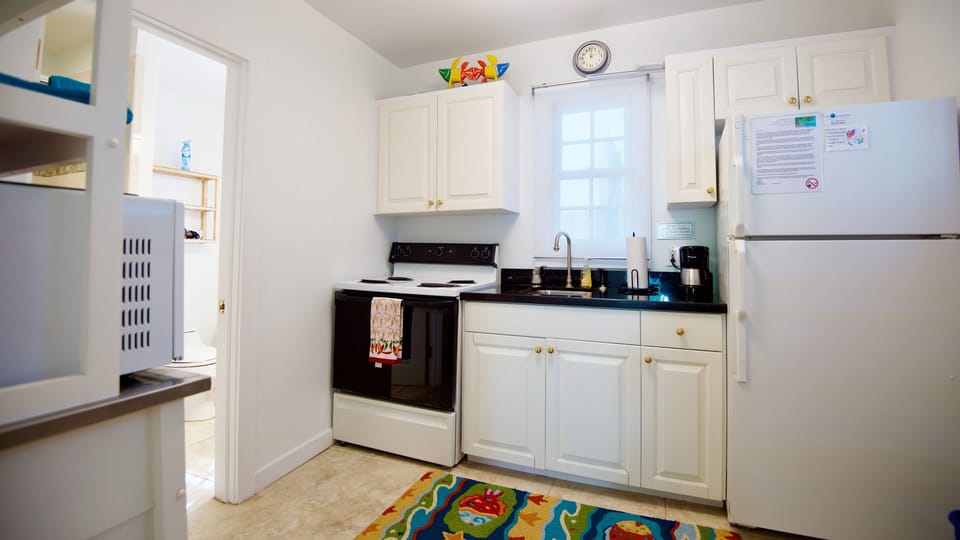 The kitchen is separate room in this Studio.