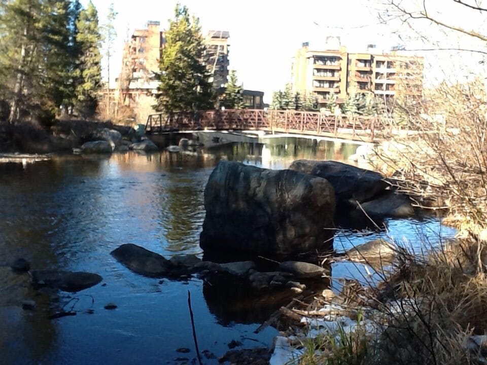 Wooden Footbridge Across Blue River to Quicksilver Lift