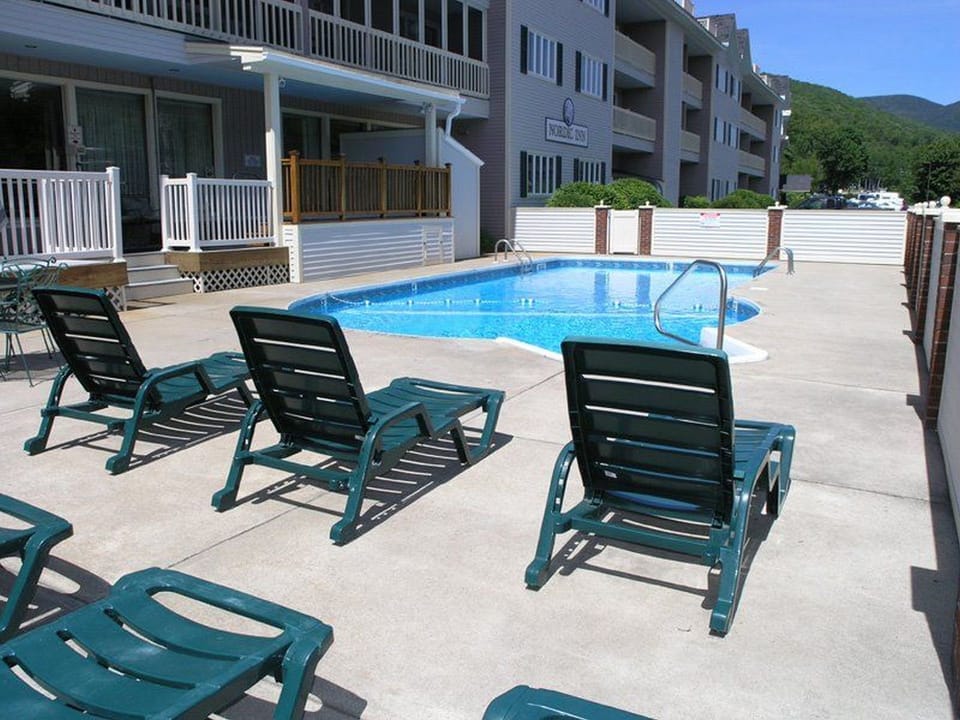 Outdoor pool area and jacuzzi