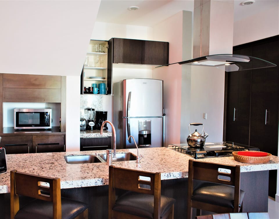 Kitchen with dishwasher & R.O. system providing excellent quality drinking water