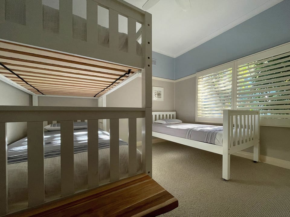 3rd bedroom with 3 king single beds