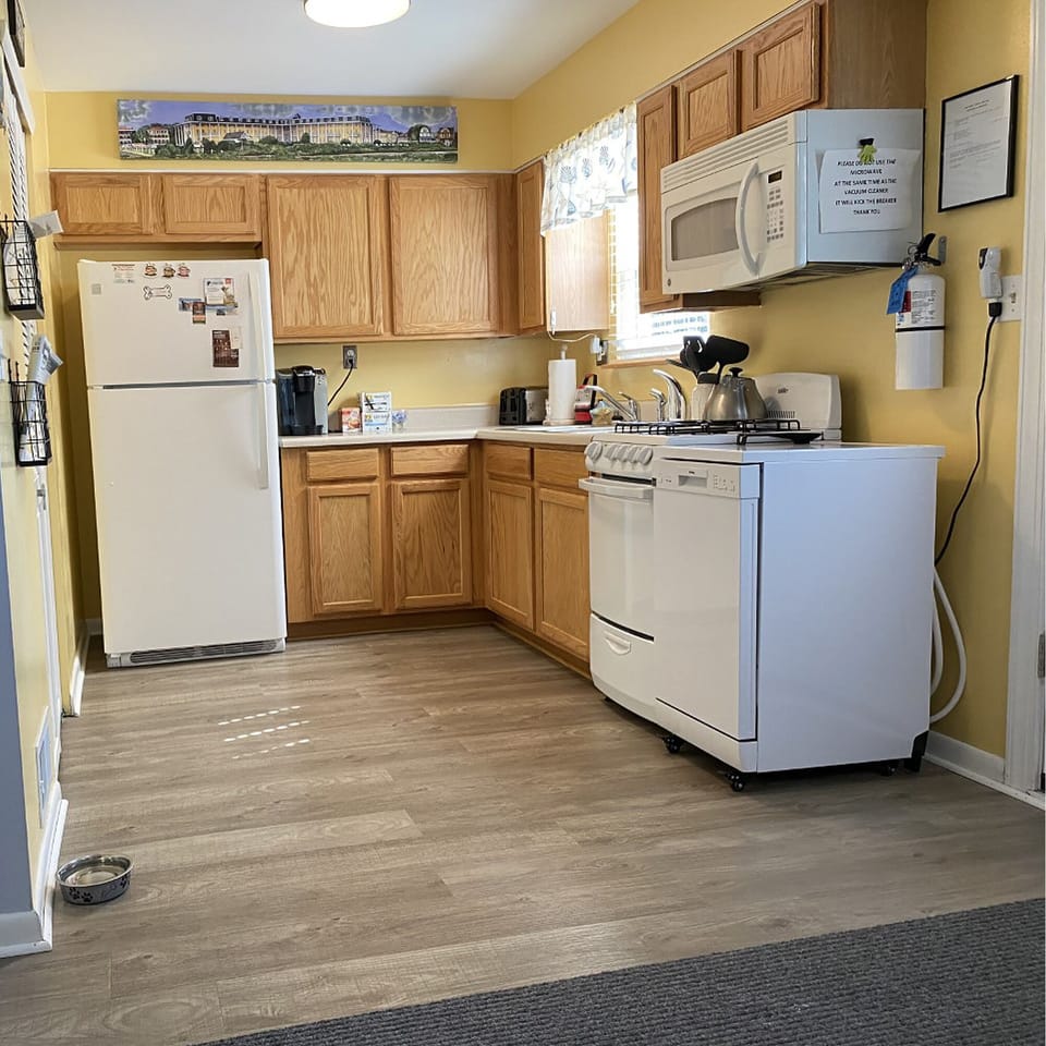 The kitchen is fully stocked to meet all of your cooking needs.