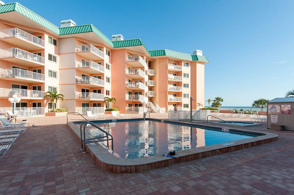 large pool deck overlooking the beach