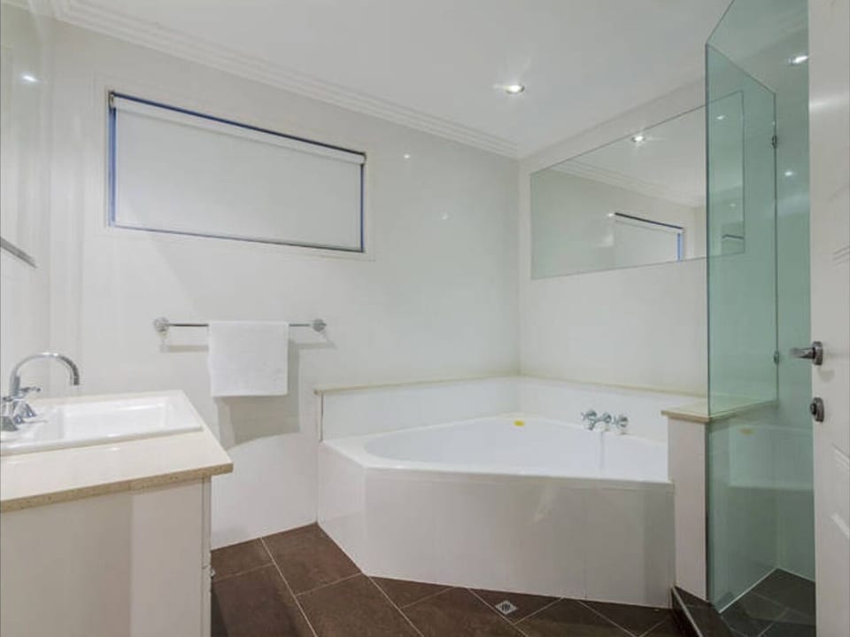 upstairs bathroom with bath and shower,outside bedrooms 3 and 4