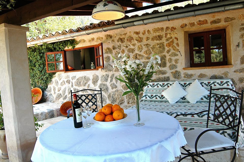 Outside dining area with comfy day bed, memorable candle light dinners