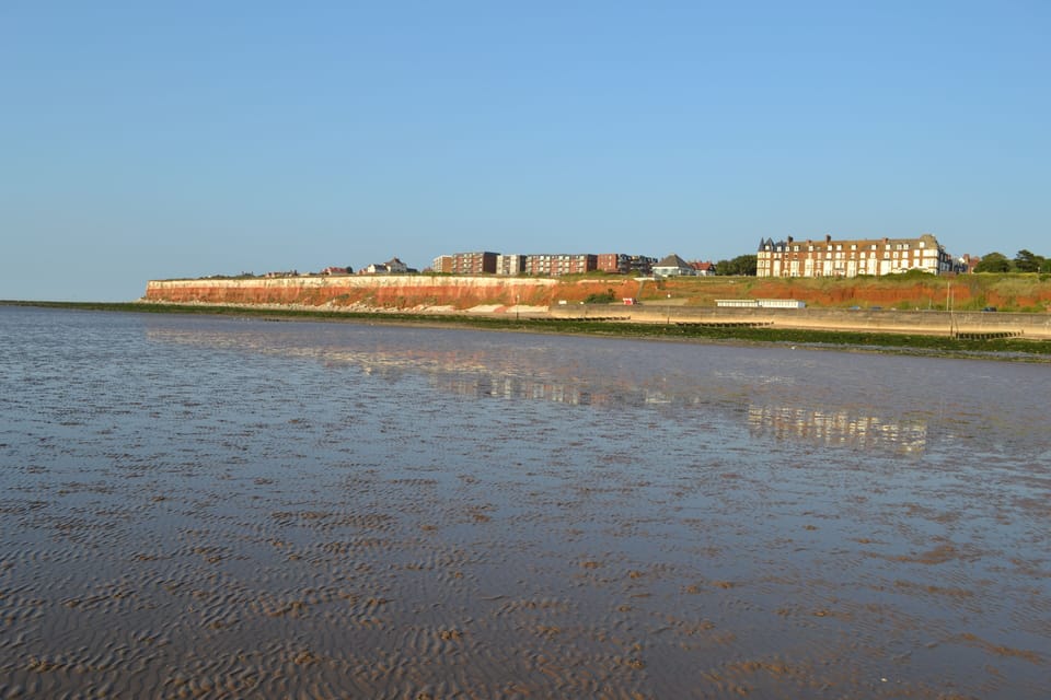 Low tide at Hunstanton looking towards the striped cliffs.