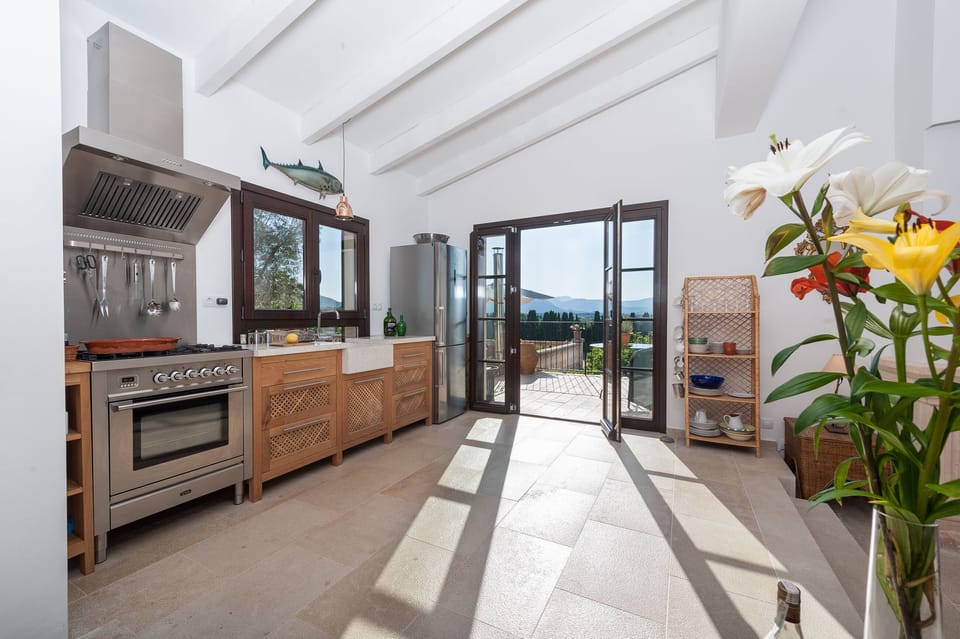 Kitchen area faced to the pool and mountains.