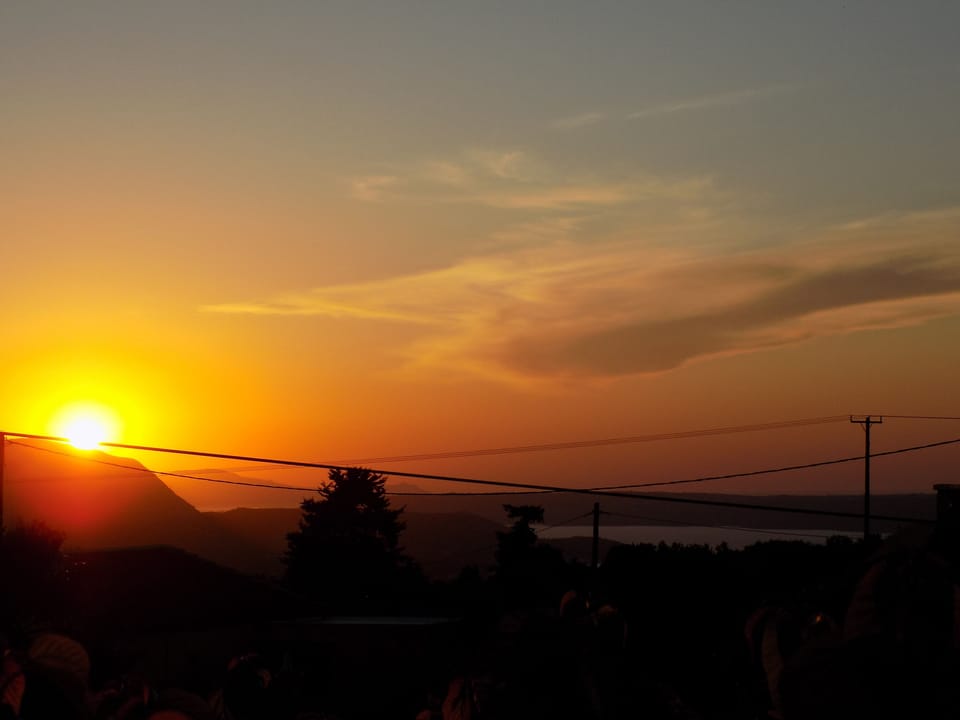 Sunset over Souda Bay - view from the roof terrace