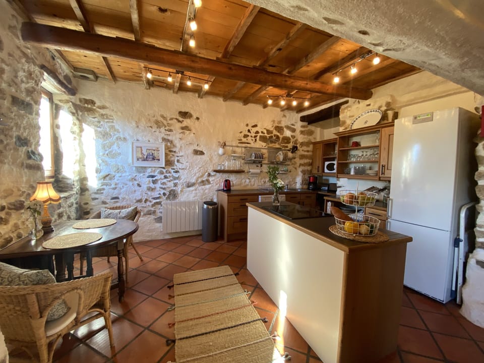 There's a breakfast nook or workstation in the kitchen