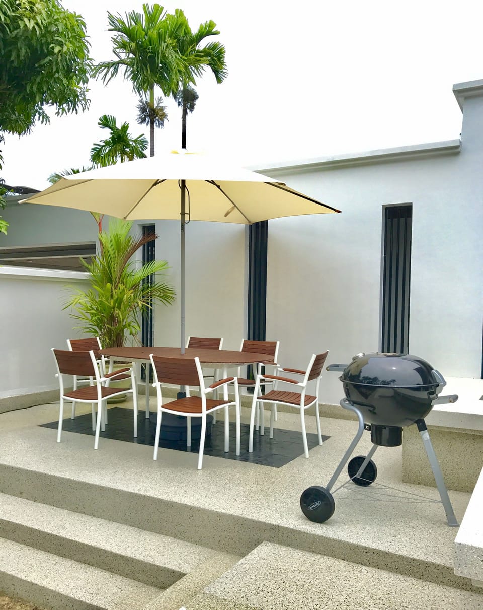 BBQ - charcoal grill and outdoor dining area