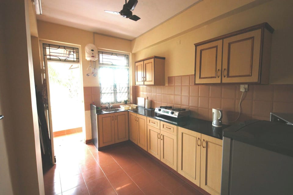 Kitchen leads onto main balcony