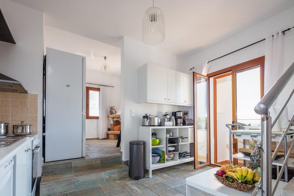 The kitchen and living room are located on the first floor.