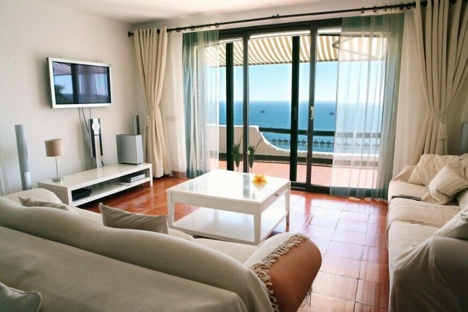 living room with doors to terrace