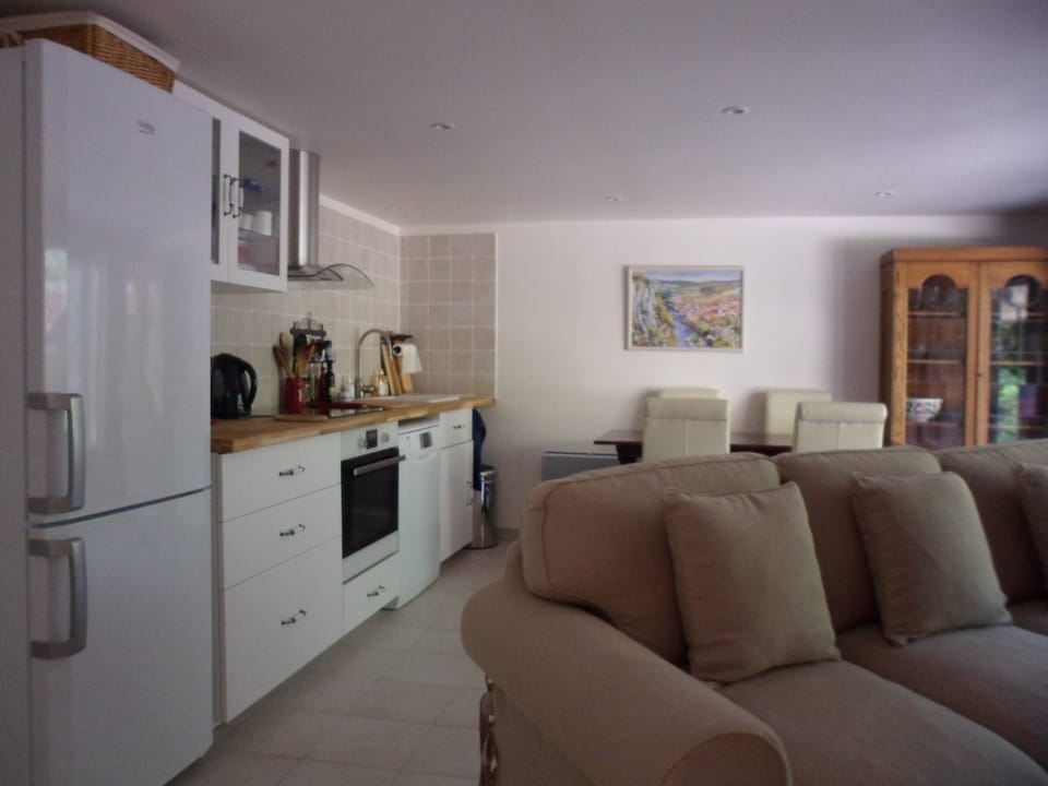 Spacious, fitted kitchen area has a fridge-freezer, ceramic hob, oven, dishwasher, extractor fan