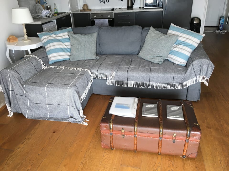 The sofa bed looking back at the kitchenette.
