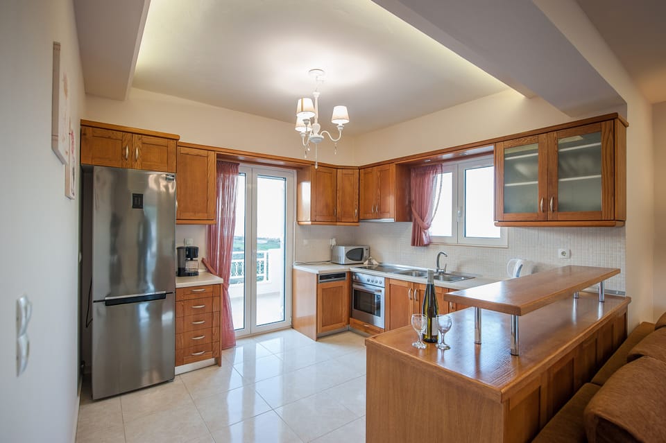 Fully equipped kitchen  for your self-catering holiday with balcony access!