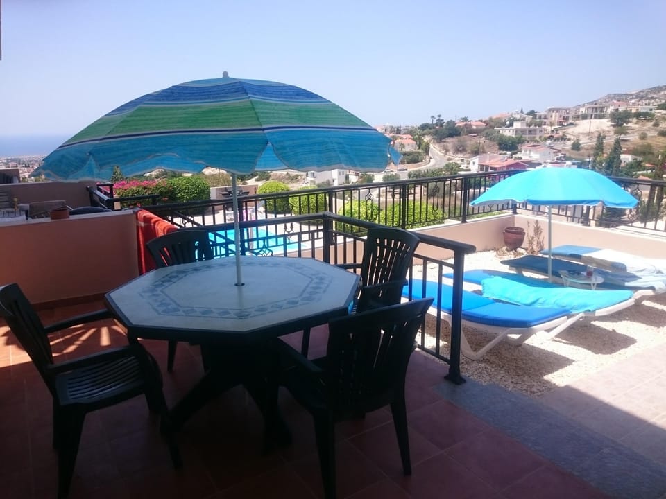 Private patio and garden with stunning views out to sea and up to the mountains.