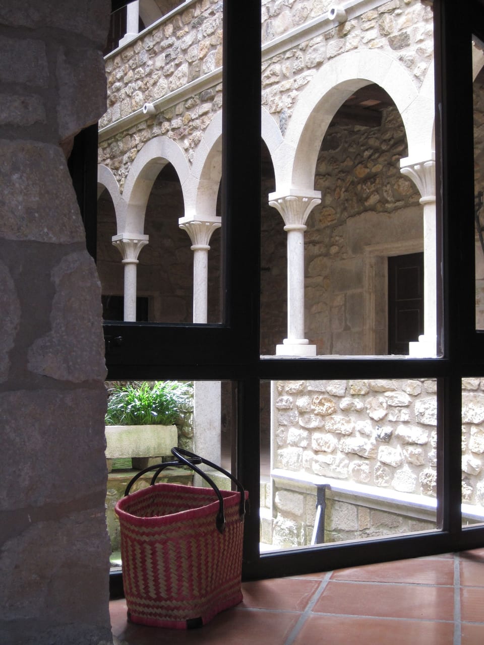 Arched loggias lead to bedrooms and surround the 10th-century circular tower 