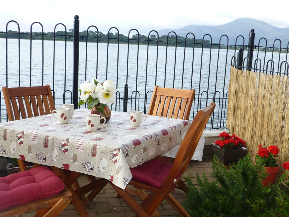 Ready for morning coffee on the patio, looking across the bay to the Mourne Mountains