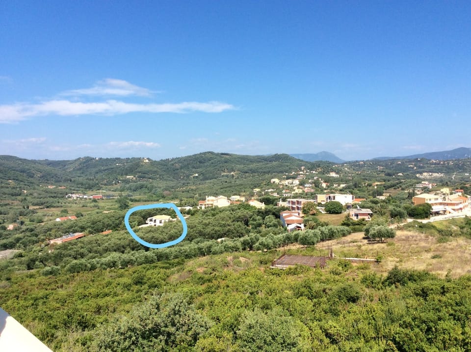 The villa is set in a private location, a short walk from two sandy beaches.