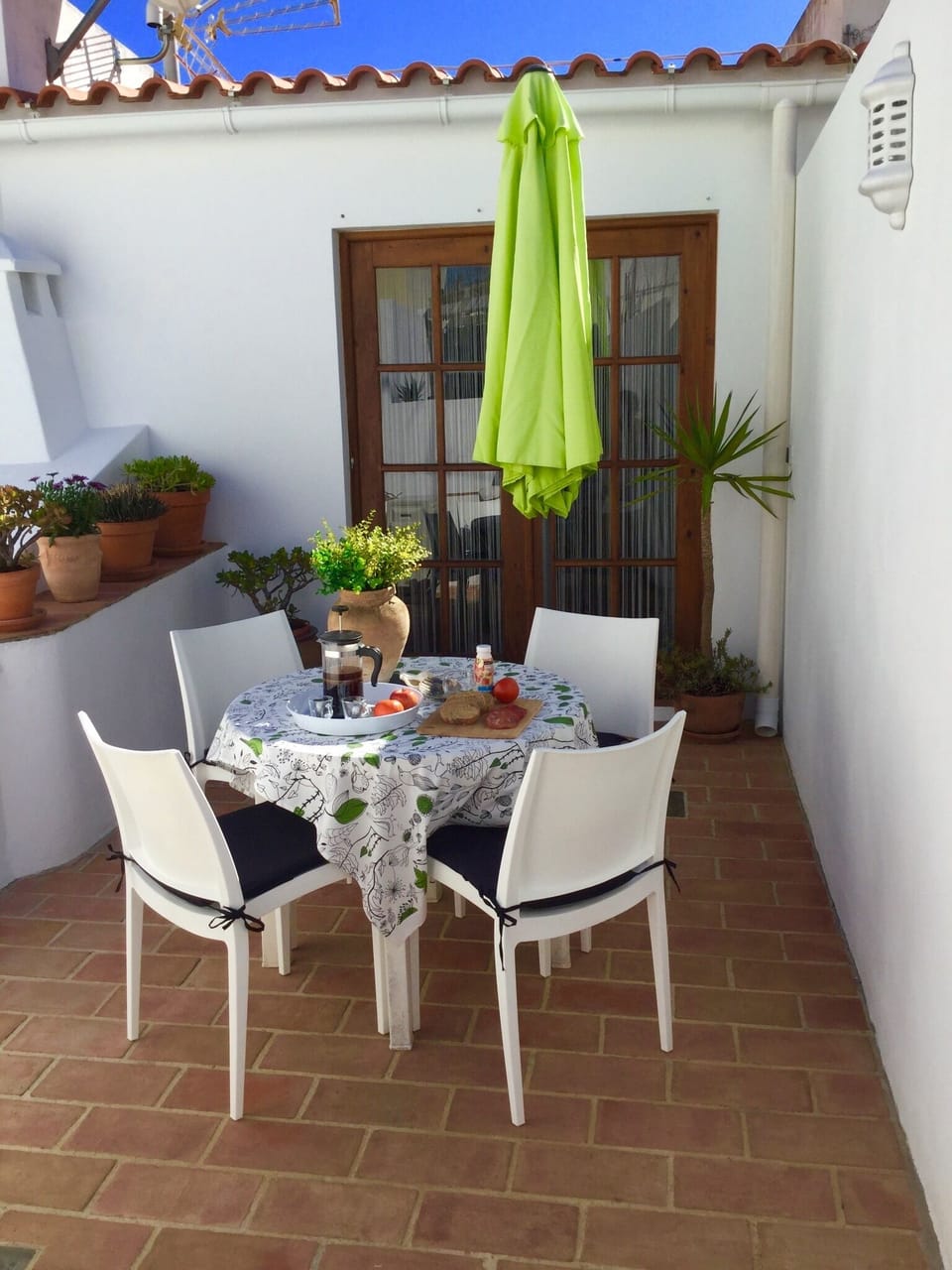 Enjoy breakfast on the sunny terrace off the Master bedroom