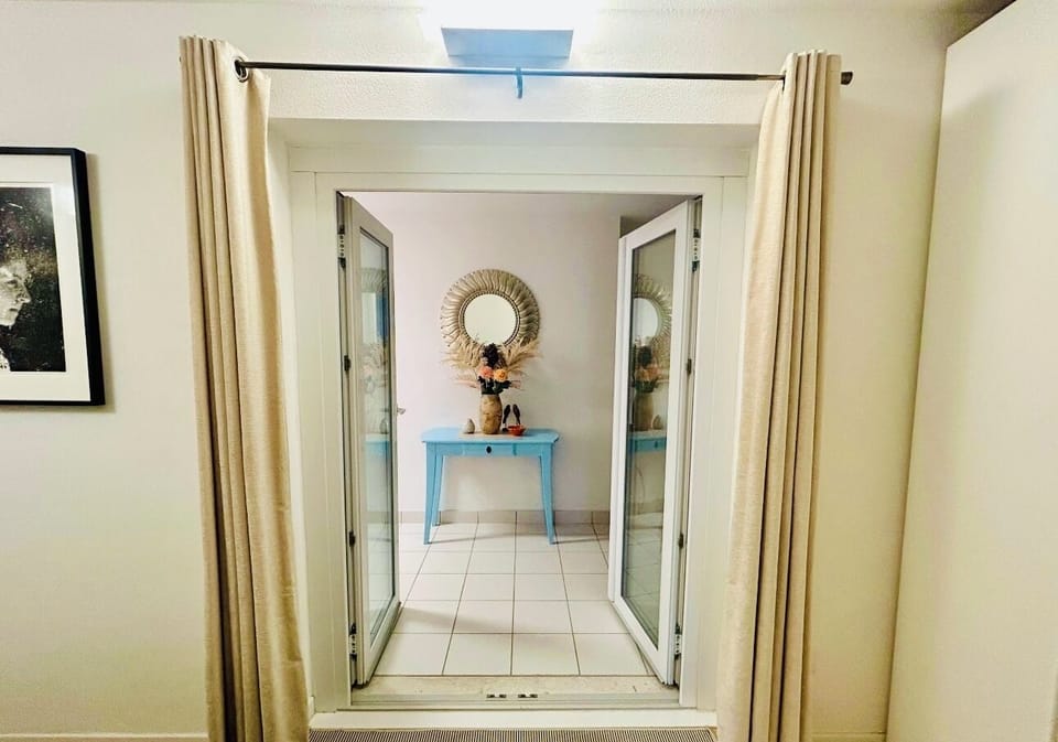 Access from 2nd bedroom to additional living area with sofabed. Home sleeps 6.