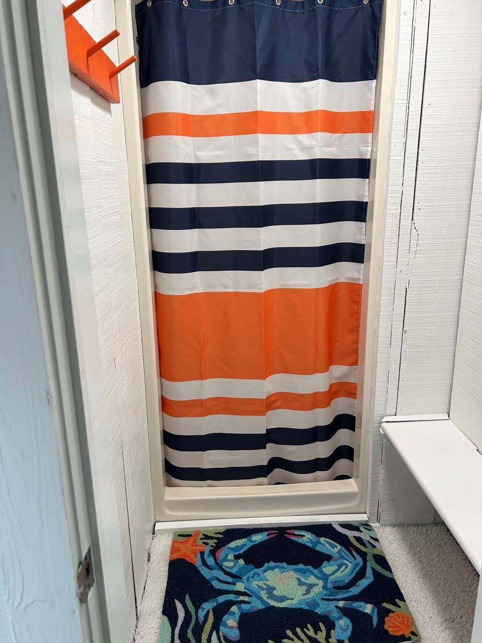 Shower in garage under Half Bath