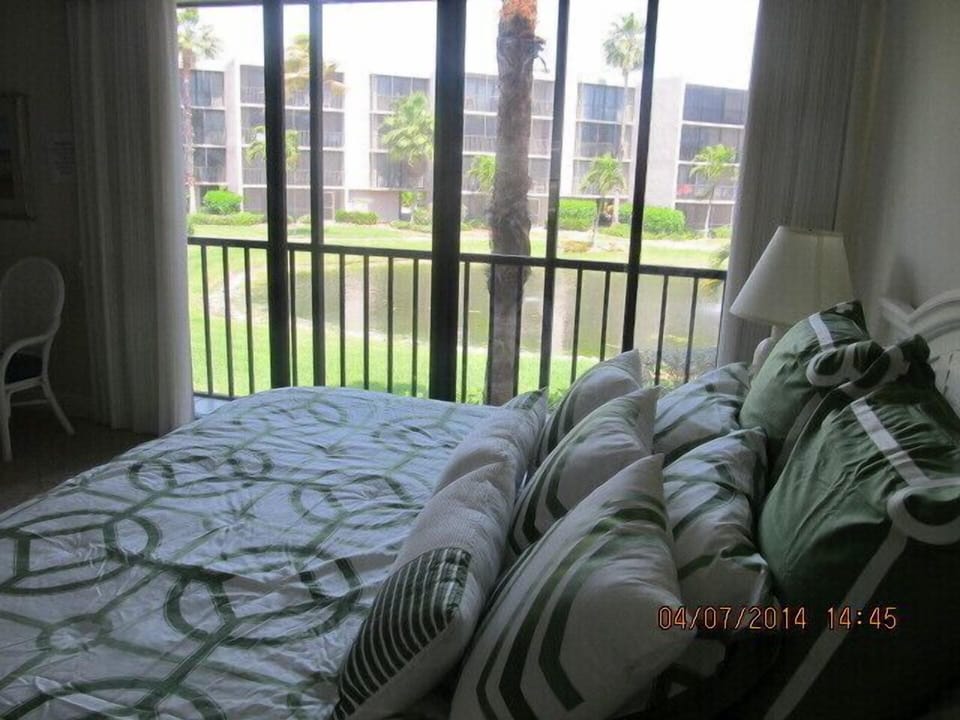 Master Bedroom looking at Courtyard and pond
