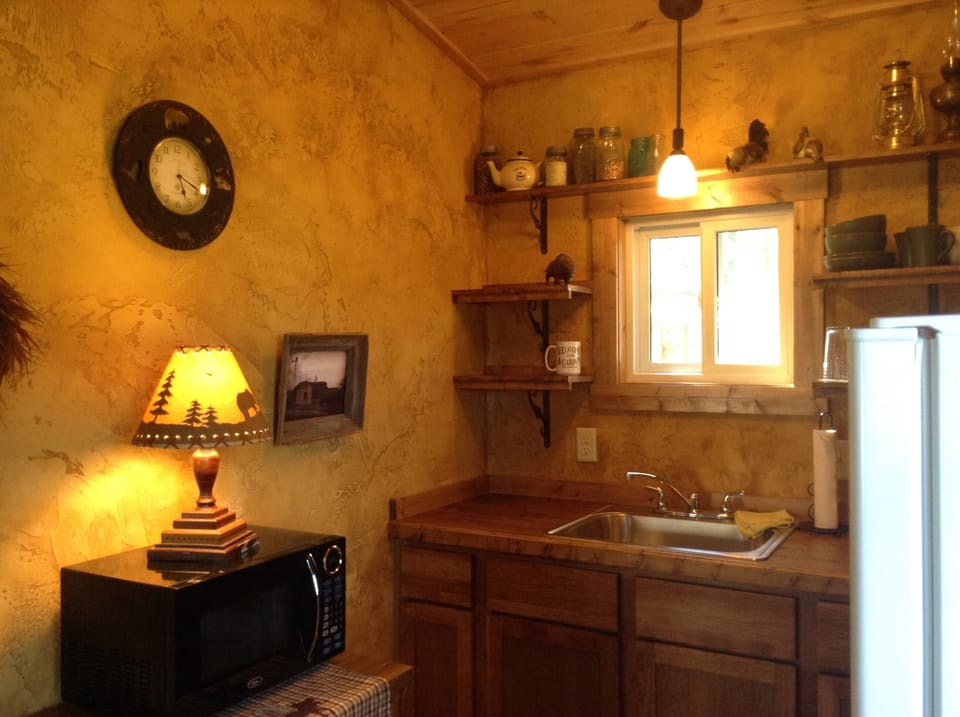 The kitchen in Hunter's cabin is small but well-equipped...all new appliances