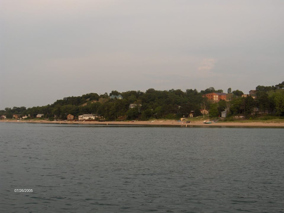 A view of the beach and cottages from the lake.