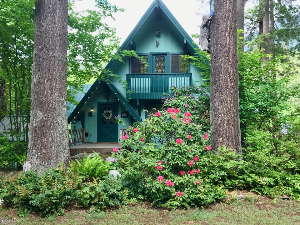 Summer at the chalet is lovely, with hiking and river activities a step away.