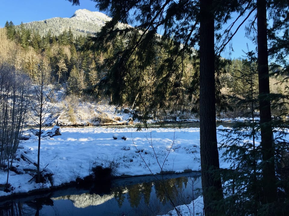 Balcony view of Beckler Peak's reflection sparkling in the winter sunshine.