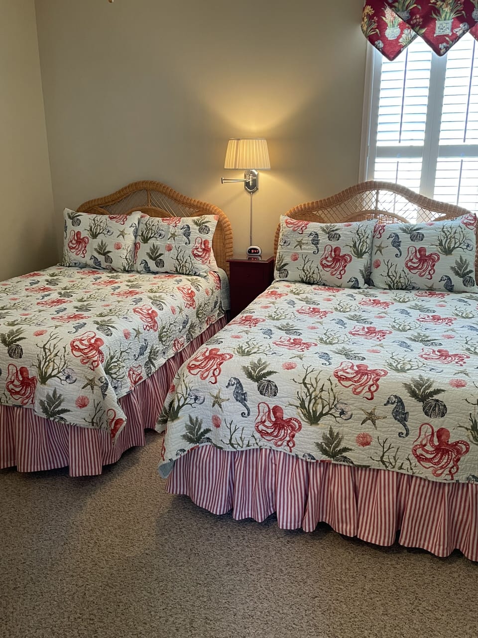 Two full-size beds with connecting Jack and Jill Bathroom.