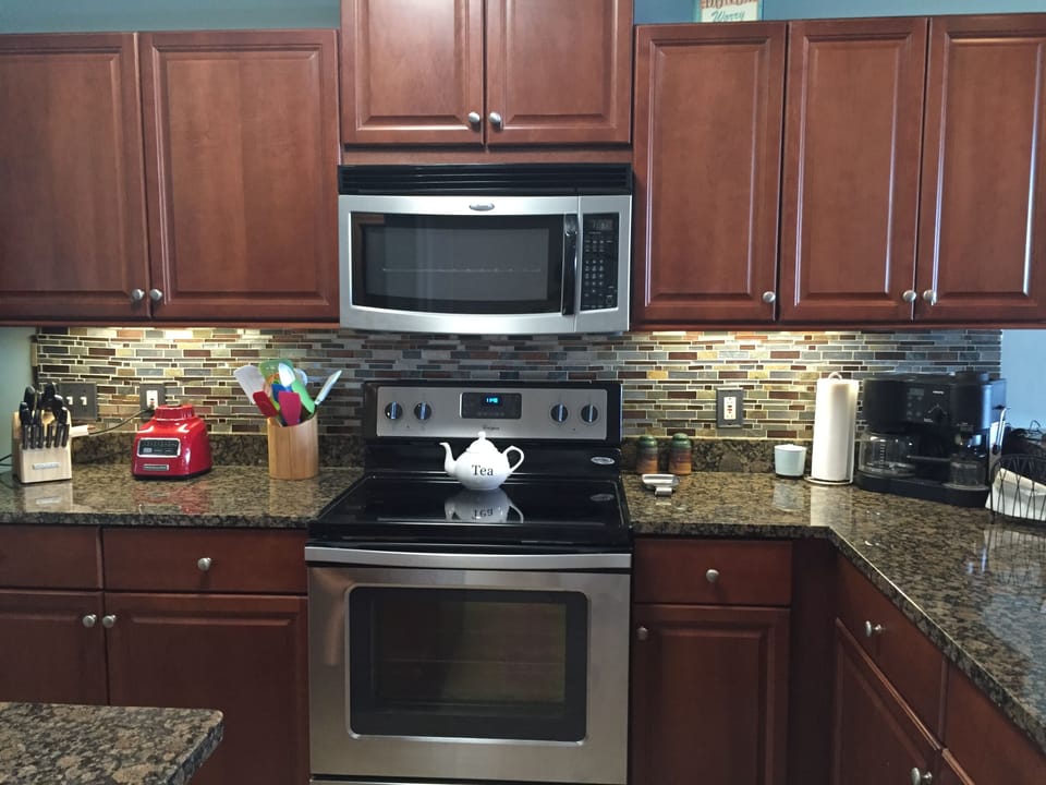 Granite countertops and stainless steel appliances