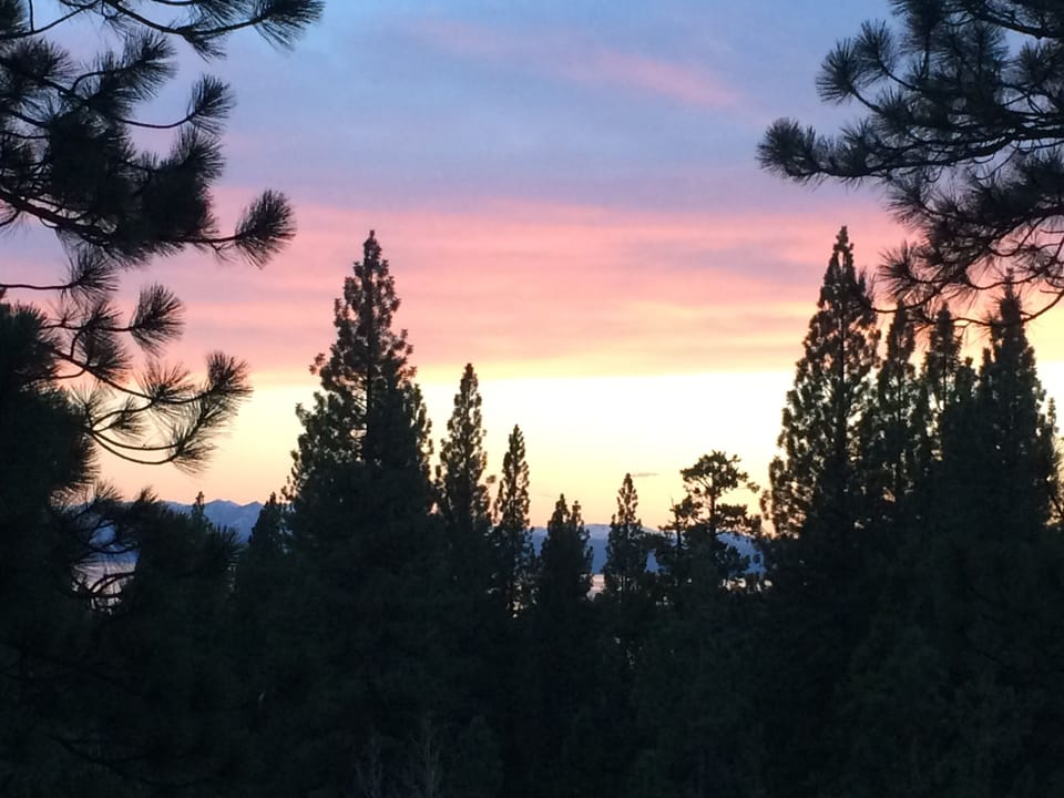 Sunset off the back of the house looking towards the lake.