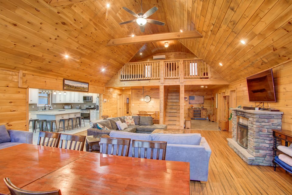 Living Room Overlooking The Loft Area 
And Kitchen.