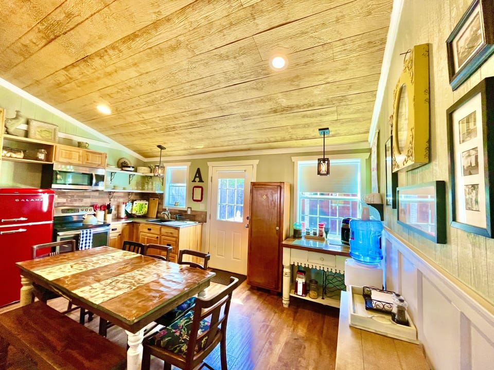 Full kitchen, with dining area and stocked Coffee Bar.
