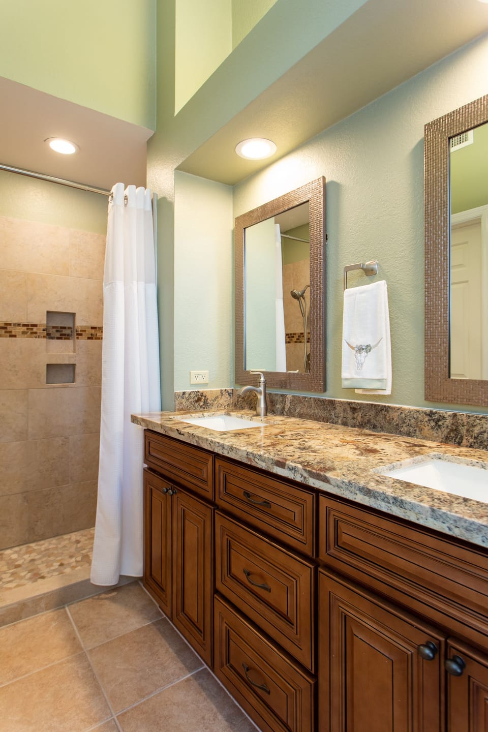 All new cabinets, granite, tiled walk in shower with double sinks