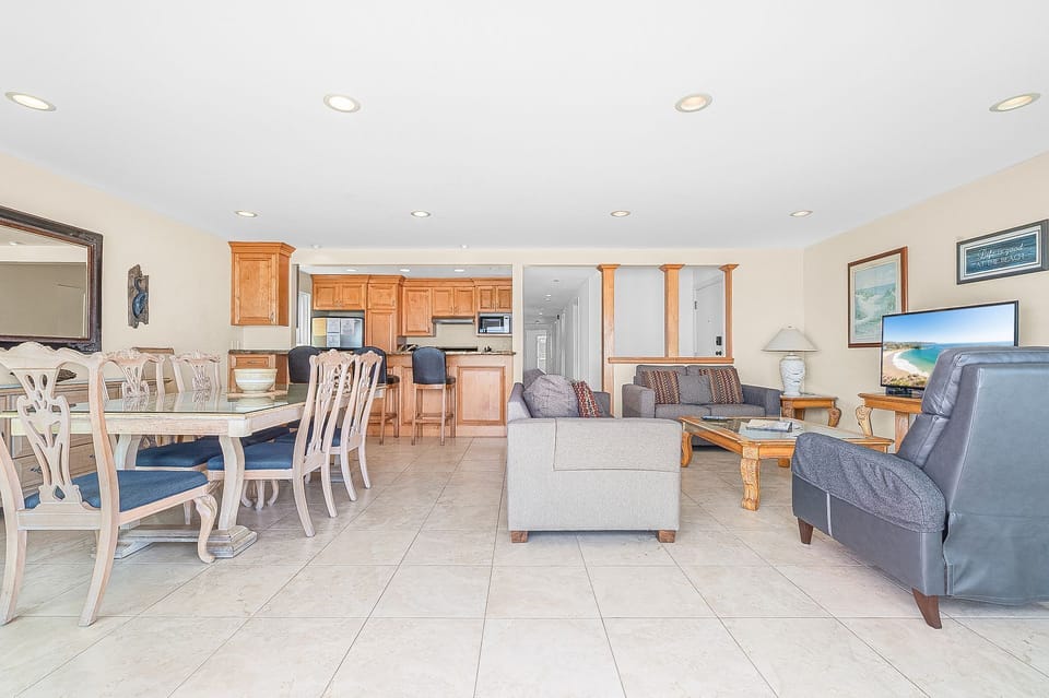 The main living area includes a sofa set with queen pullout sofa bed and cable TV
                