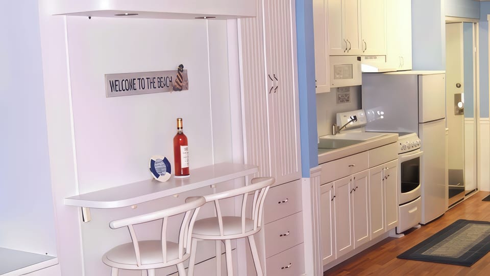 KITCHEN AREA: Bar Seating and Kitchen