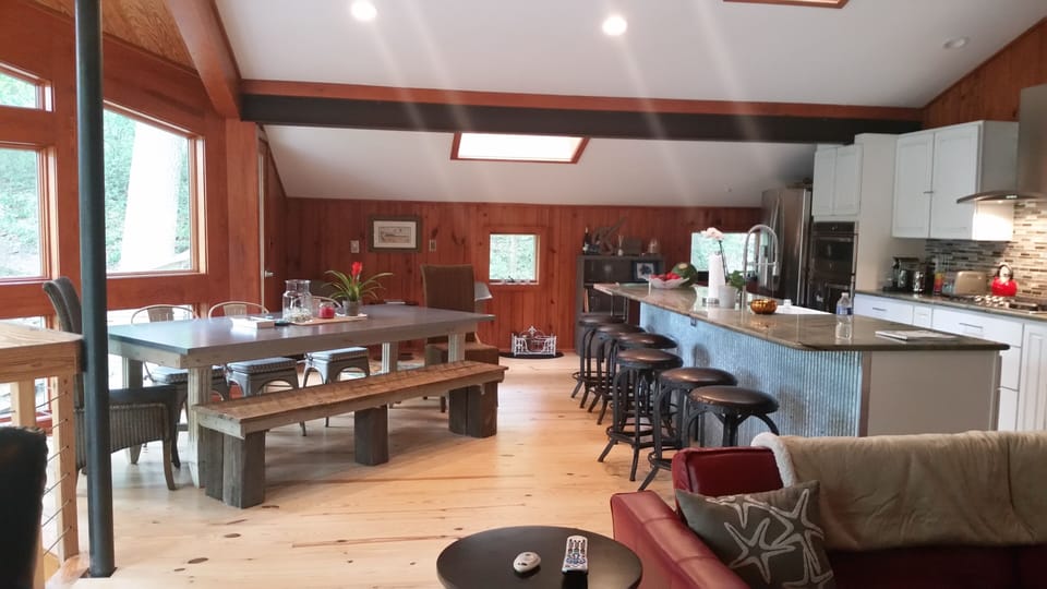 Large dinning room table for 10 plus 6 bar seats!  Cheers.