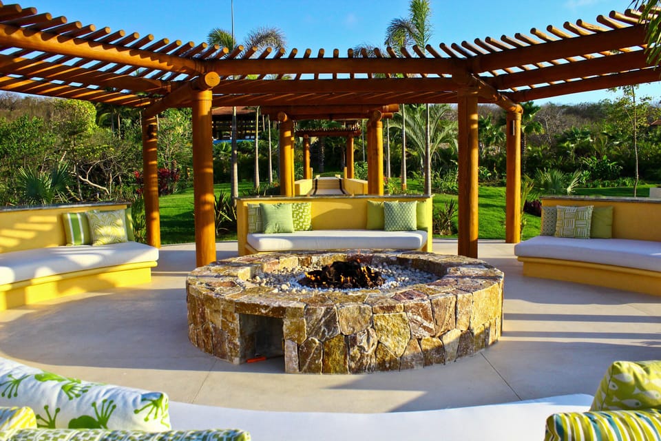 Enjoy a cocktail around the fire pit at night. 