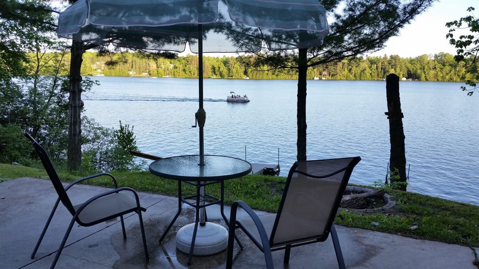 Lower patio near the lake and firepit