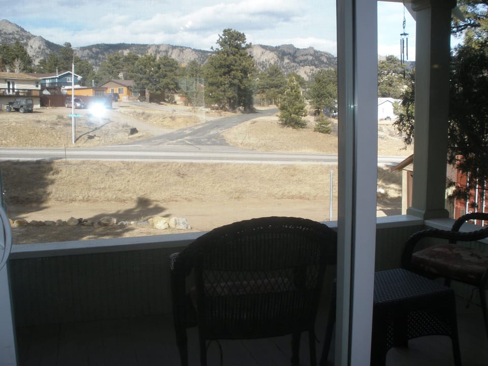 View from living room.. Nice covered porch..