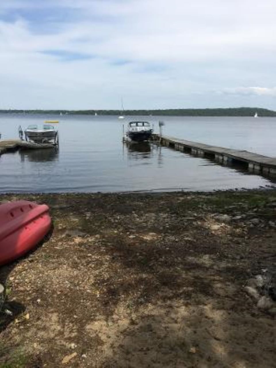 Lake access with dock on the left.  Dock is for swim access only. 