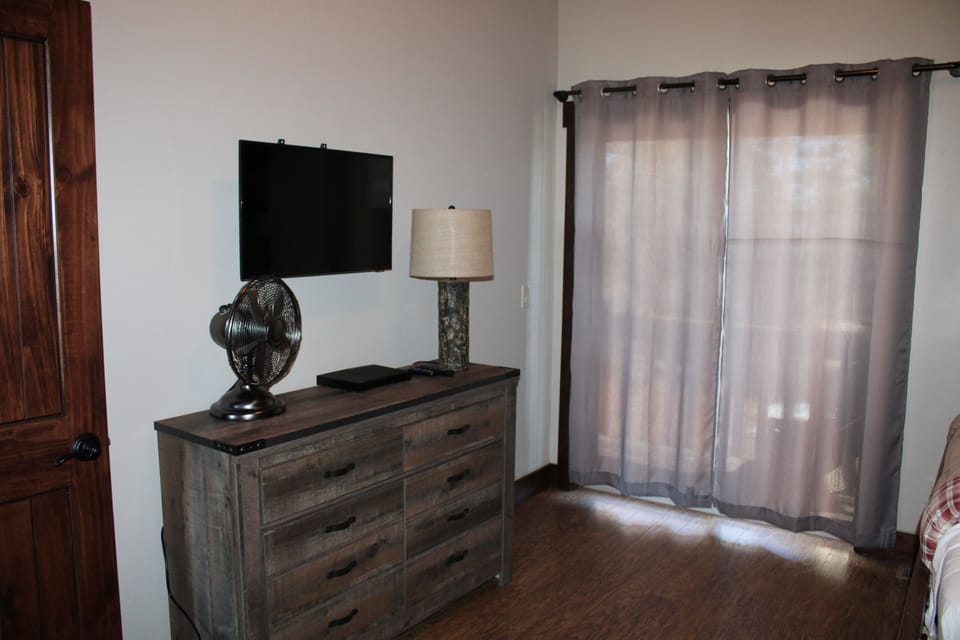 Bunk bed room and doors to upstairs balcony